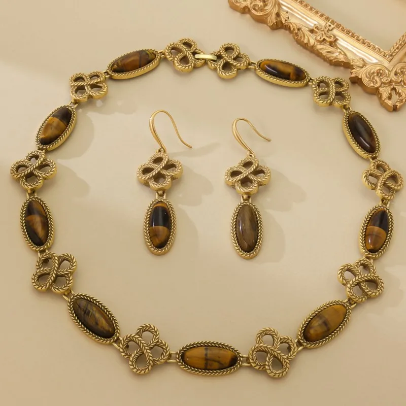 KEQIU Medieval Western heavy industry tiger's eye necklace, oval court style necklace, ear hook set