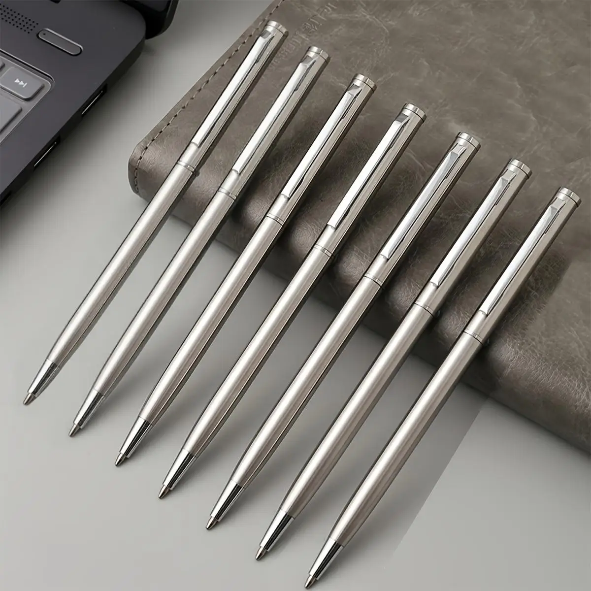 Set of 20 Elegant Silver Stainless Steel Ballpoint Pens - Durable, medium nib, twist-top design, smooth writing, perfect for off