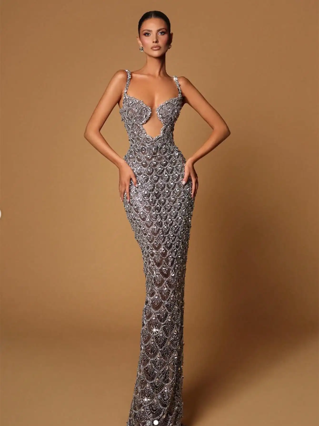 Sparkling Sequin Mermaid Gown with Deep V-Neck and Cutout Detail