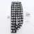 Black and white plaid trousers