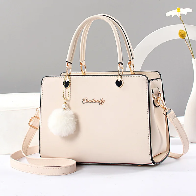 Stylish casual women's handbag, commuter shoulder bag crossbody bag, small hair ball pendant decoration