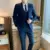 Two-button navy blue suit + suit pants with tie belt