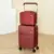 Red With Suitcase
