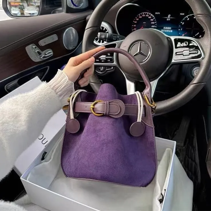 Niche design high-end purple velvet bucket bag women's 2025 spring new commuter trendy shoulder messenger bag