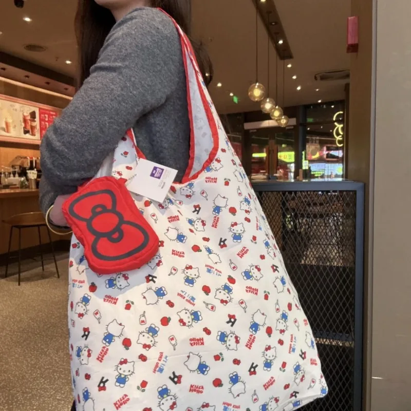 2026 New Shopping Bag Kitty Red Bow Folding Storage Environmentally Friendly Bag Full Print One-shoulder Hand Carry Tote Bag